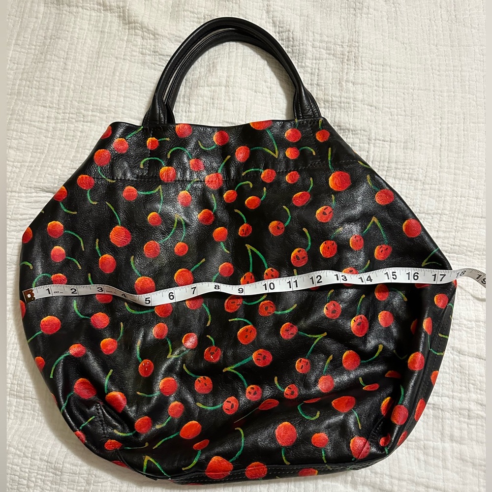 Rough & Tumble red and black purse.
